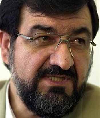 Hard-line Iranian presidential candidate Mohsen Rezaei, former head of the elite Revolutionary Guards, speaks with media in this April 15, 2003 file photograph.