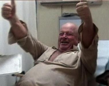 In this image made from video released by the US Department of Defense, freed Australian hostage Douglas Wood, gives the thumbs up after receiving medical checks at a US military facility in Baghdad, Iraq, Wednesday June 15, 2005. 