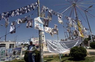 of candidates in Iran's presidential elections, seen in Quchan 800 kms northeast of Tehran on the last day of election campaigning, Iran, Wednesday, June 15, 2005. Hard-line candidate Mohsen Rezaei withdrew from Iran's presidential race Wednesday, heeding the advice of clerics that the conservative vote was dangerously split in Friday's polls, state television reported. (AP