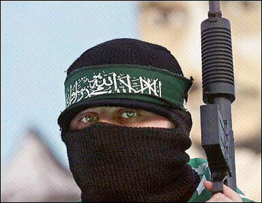  masked Hamas militant holds up a gun during a rally in Gaza City. The European Union said it had opened contacts with officials from the radical Palestinian movement Hamas despite its status as a blacklisted terrorist organisation.(AFP/File