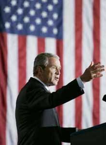 U.S. President George W. Bush gestures while making remarks about Medicare at the Department of Health and Human Services in Washington, D.C. June 16, 2005. Photo 