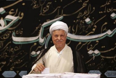 Former Iranian president and election front-runner Akbar Hashemi Rafsanjani casts his ballot in the Iranian presidential election in Tehran June 17, 2005. REUTERS