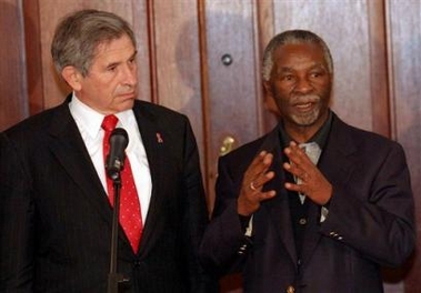 New World Bank chief Paul Wolfowitz, left, with South African President, Thabo Mbeki, at a news conference in Pretoria, South Africa, Saturday June 18, 2005.