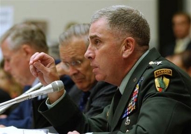 General John Abizaid testifies on the progress of Iraqi security forces on Capitol Hill, Thursday, June 23, 2005, before the House Armed Services Committee in Washington.