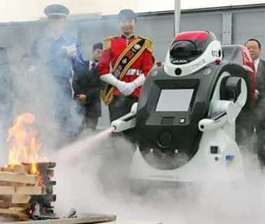 Japanese alarm company Sohgo Security Services Co. demonstrates the company's newly developed security robot 'Guardrobo D1' in Tokyo June 23, 2005. 