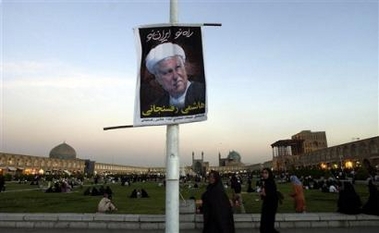 Former Iranian President and presidential candidate Akbar Hashemi Rafsanjani's poster hangs on a lamp post at Naghsh-e-Jahan square in Isfahan, Iran, Wednesday June 22, 2005. 