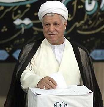 Iranian presidential candidate Akbar Hashemi Rafsanjani casts his ballot in the Iranian presidential run-off election in Tehran on Friday June 24, 2005.