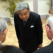 Japan's Emperor Akihito bows to representatives of Japanese war veterans and bereaved on the U.S. territory of Saipan June 27, 2005. 