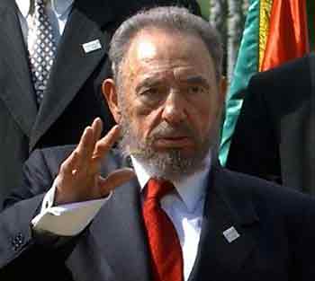 Cuban President Fidel Castro waves during a photo call at a hotel in Puerto La Cruz, Venezuela, Wednesday, June 29, 2005.