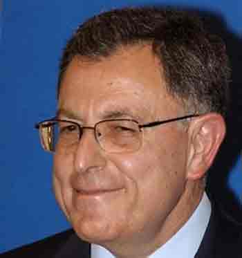 Lebanese Prime Minister-Designate Fuad Saniora smiles during a press conference, following his appointment, at the presidential palace in Baabda, in the outskirts of Beirut, Lebanon, Thursday, June 30, 2005. 