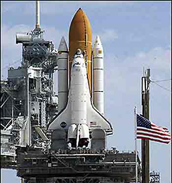 The space shuttle Discovery, seen here on June 15, reaches the top of launch pad 39-B at Kennedy Space Center, Florida. 