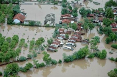 An aerial view of a flood-submerged area in Kheda district, about 40 kilometers (25 miles) south of Ahmadabad, India, Saturday, July 2, 2005. 
