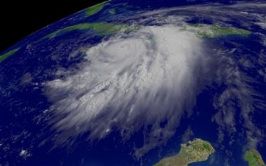 Hurricane Dennis is seen in this NOAA satellite image taken Thursday, July 7, 2005. Hurricane Dennis dumped heavy rain on Haiti and its winds strengthened to 105 mph Thursday as it spun toward Jamaica. Hurricane warnings were posted in the Florida Keys and Cuba, including at the U.S. Navy base at Guantanamo Bay, and forecasters said the storm could hit anywhere from Florida to Louisiana. (AP