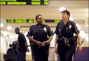 Police patrol a tunnel under commuter train platforms at Union Station in Los Angeles 07 July 2005. Nations around the world tightened security after a string of deadly bombings rocked London, attacks that Britain said bore the hallmarks of Muslim militant group Al-Qaeda