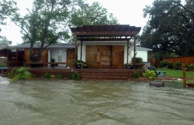 The backyard of a home in Fort Walton Beach, Fla., on the Choctawhatchee bay, is seen Sunday, July 10, 2005. 