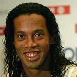 Brazilian soccer star Ronaldinho smiles during a news conference in Athens June 30, 2005. Ronaldinho is on a one-day trip to Athens to participate the draw ceremony of Greek first division soccer league.