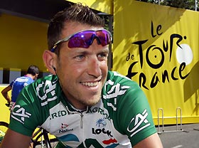 Credit Agricole team rider Christophe Moreau of France waits on his bicycle before the start of the 192km (119 miles) 10th stage of the 92nd Tour de France cycling race between Grenoble and Courchevel, July 12, 2005.