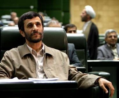 Iran's President-elect Mahmoud Ahmadinejad sits in the parliament building in Tehran July 12, 2005. Ahmadinejad met with Parliamentarians to discuss the composition of his future cabinet. Ahmadinejad assumes office on August 4. REUTERS