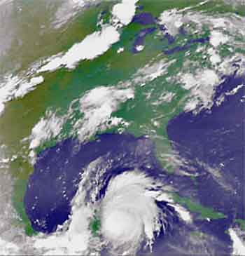 In this image released by NASA collected at 11:25pm EDT Sunday, Hurricane Emily is shown approaching the Yucatan Peninsula of Mexico. (AP