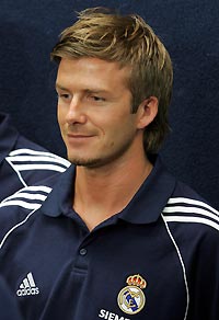 Real Madrid's David Beckham smiles during a ceremony where the team exchanged gifts with Chicago Mayor Richard Daley at City Hall in Chicago July 15, 2005. 