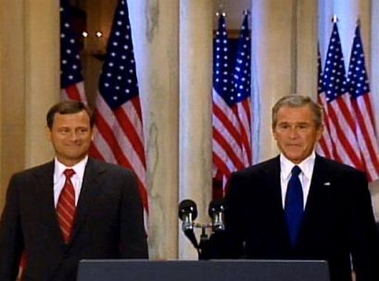 President Bush arrives with federal appeals court judge John G. Roberts Jr., his nomination to replace retiring Justice Sandra Day O'Connor, Tuesday, July 19, 2005, at the White House in Washington.