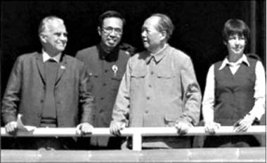 Edgar Snow (first left), the US journalist and writer known for his book "Red Star Over China," chats with Chairman Mao Zedong on October 1, 1970 on the Tian'anmen Rostrum in Beijing as they view the grand celebration of the 21st anniversary of the founding of the People's Republic of China.