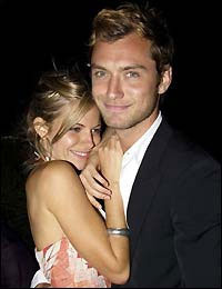 Jude Law and his fiancée Sienna Miller