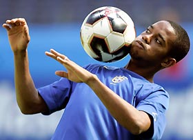 Brazilian striker Robinho plays the ball during a practice session in Frankfurt, Germany, in this June 28, 2005 file photo. Real Madrid have reached a deal to sign Robinho, one of Brazil's most exciting players, from Santos, the player's agent said on Thursday. Picture taken June 28, 2005.