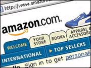 Amazon profits dip as sales rise 