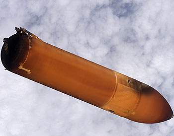 Still image released by NASA July 27, 2005 and taken by Discovery's crew, shows the external fuel tank as it was jettisoned after its launch on July 26. NASA halted future shuttle flights on Wednesday after learning that a large chunk of insulating foam broke off Discovery's external fuel tank during launch, an echo of the problem that doomed sister ship Columbia and its crew 2-1/2 years ago.