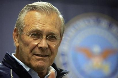 U.S. Secretary of Defense Donald Rumsfeld speaks to reporters Wednesday July 27, 2005 as he flies back to the U.S. from a swing through Central Asia and Iraq