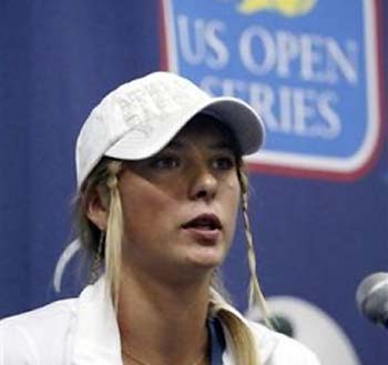 Maria Sharapova, of Russia, speaks during a press conference after she has withdrawn from JP Morgan Chase Open due to a right pectoral muscle strain in Carson, Calif., Friday, Aug. 12, 2005. (AP