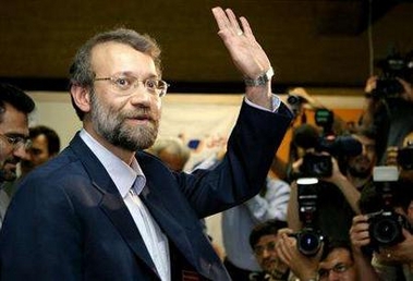 Ali Larijani, former head of state broadcasting, waves in this file photo taken May 14, 2005. Larijani, a conservative with close ties to Supreme Leader Ayatollah Ali Khamenei, has formally taken over as Iran's chief nuclear negotiator, state television reported on Monday. REUTERS