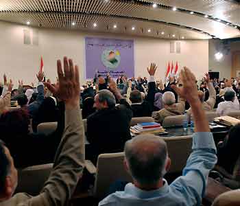 Iraq's National Assembly votes unanimously for a seven-day extension for the constitution draft on the eve of the original deadline in Baghdad August 15, 2005. 