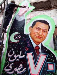 Egyptian painter Samir Khamis puts the final touches on a giant billboard for Egyptian President Hosni Mubarak at a workshop in Cairo Tuesday, Aug. 16, 2005 a day before Egypt's first competitive presidential campaign begins. 