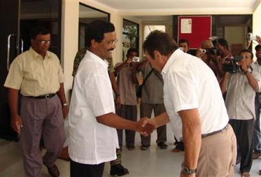 In this photo released by the Liberation Tigers of Tamil Eelam (LTTE), head of Sri Lanka Monitoring Mission Hagrup Haukland, right, shakes hands with the LTTE political chief, S.P. Thamilselvan during their meeting in Kilinochchi, Sri Lanka, Thursday, Aug. 18, 2005. 