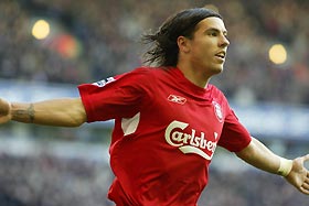 Liverpool's Milan Baros, of the Czech Republic, celebrates scoring against Newcastle United in their English Premier League soccer match at Anfield in this December 19, 2004 file photo.