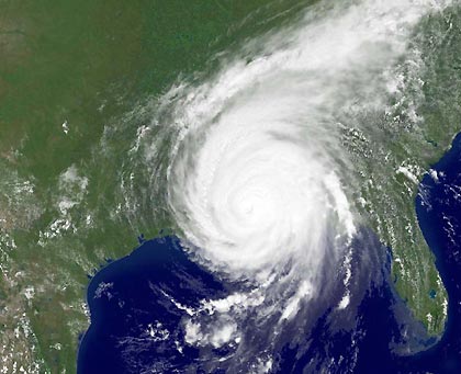 National Oceanic and Atmospheric Administration satellite image of Hurricane Katrina taken as the storm continued to move farther inland after it came ashore along the U.S. Gulf Coast on August 29, 2005.