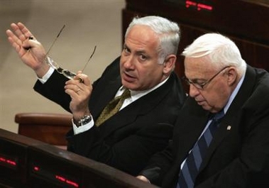 Israeli Parliament member Benjamin Netanyahu, left, gestures next to Israeli Prime Minister Ariel Sharon, during a session in the Knesset, Israel's parliament in Jerusalem, in this March 2, 2005 file photo.