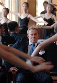 Britain's Prime Minister Tony Blair watches a masterclass of ballet taken by Darcy Bussell, unseen, in Beijing, China, Tuesday Sept. 6, 2005, part of a cultural exchange programme between Britain and China.