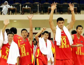China team players celebrate after winning against Iran during the 23th Asian Basketball Championships at Al-Gharrafa hall in Doha, Qatar September 8, 2005. 