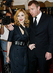 Madonna well enough to travel with husband to Toronto