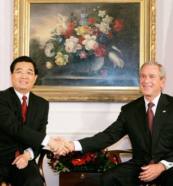 Chinese President Hu Jintao told President Bush Tuesday that China was willing to work with the United States to ease a growing trade imbalance and acknowledged there were frictions in the economic relationship, the Reuters reported.