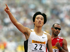 China抯 star hurdler Liu Xiang reacts as he crosses the finish line in the men抯 110m hurdle final at the Seiko Super track and field meet in Yokohama yesterday.?Liu won the final with a time of 13.08 seconds. Behind him is Jamaican Maurice Wignall.? 