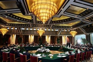 Diplomats attend talks on the North Korean nuclear crisis at the Diaoyutai State Guest House in Beijing September 19, 2005.