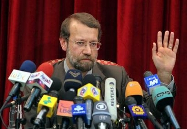 Iran's top nuclear negotiator Ali Larijani, gestures, as he speaks with media during a press conference in Tehran, Iran, Tuesday, Sept. 20, 2005. 