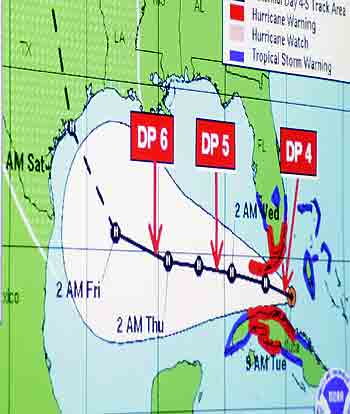 A graphic showing the predicted track of Hurricane Rita is shown during a briefing to U.S. President George W. Bush by officials aboard the USS Iwo Jima in New Orleans, September 20, 2005. Rita grew from a tropical storm to a hurricane with 85 mph (136 mph) winds. Bush travelled to Gulfport and New Orleans to tour the cities devastated recently by Hurricane Katrina. [Reuters]