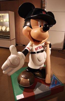 A statue of Mickey Mouse entitled "Home Run Hero" designed by actor Ben Affleck stands in a room at Sotheby's in New York City on September 20, 2005. 