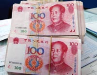 China's 
central bank will "gradually" lessen the degree to which it intervenes in foreign exchange markets, but is not certain the country's yuan currency is undervalued, a senior central bank official said in an interview published on Thursday. 