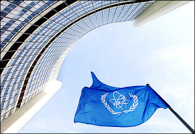 IAEA flag in front of the International Atomic Energy Agency headquarters in Vienna.